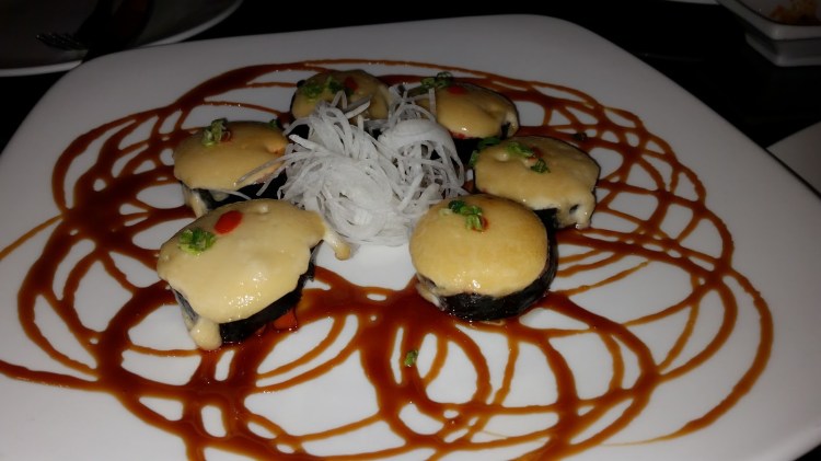 Spicy tuna, cucumber, tempura crunch, togarashi, spicy motoyaki mayo, eel sauce. Aom Places To Eat And Drink Kona Grill