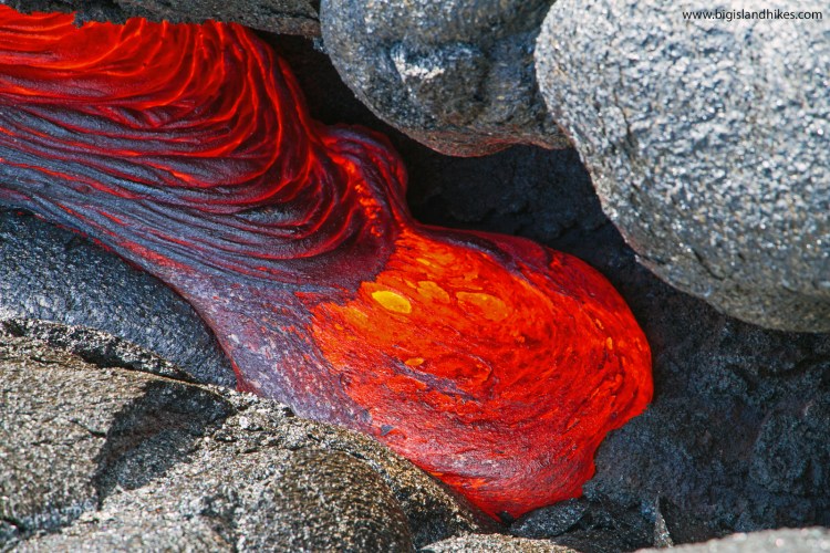 Tourists view the active lava flow in hawaiian volcanoes national park after the flow crossed the emergency access road on july 26, 2016. Hike To Flowing Lava Big Island Hikes